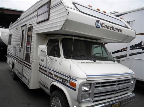 Cloudy spots that show on the front seats are camera related. . 1987 coachmen motorhome for sale